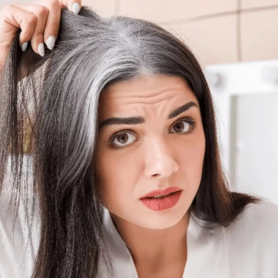 Why does hair turn gray so much and so quickly after age 40?