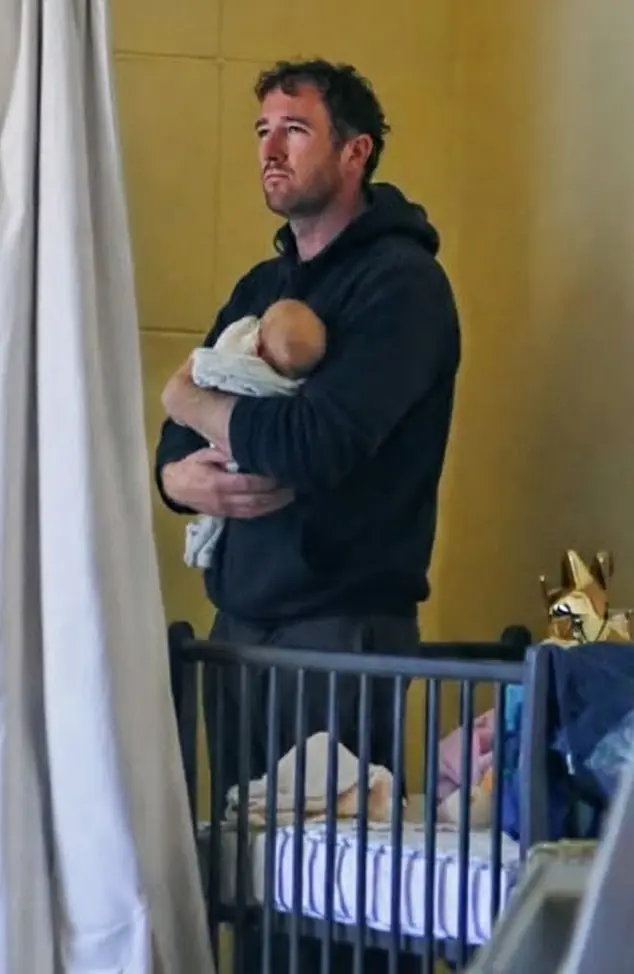 Silent Battles: A Father’s Night Beside His Sleeping Child