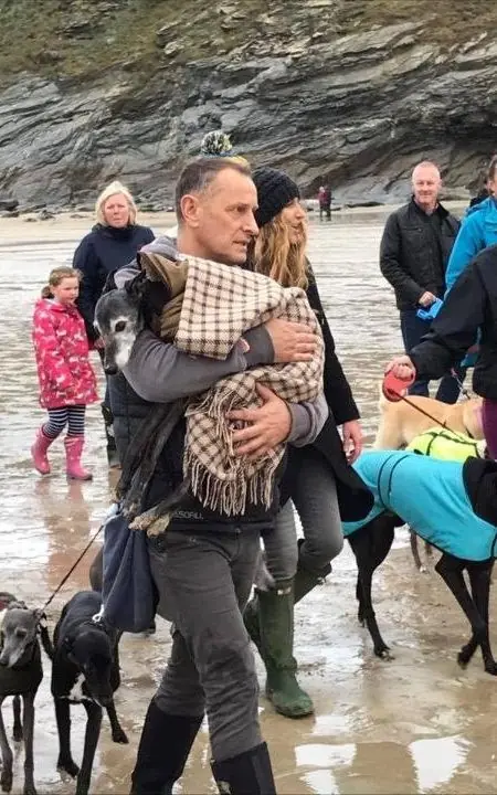 Hundreds joined Walnut the dog on final walk on Cornish beach before being put down