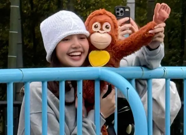 BLACKPINK’s Lisa Visits Orphaned Baby Monkey Punch Who Found Comfort In A Stuffed Toy